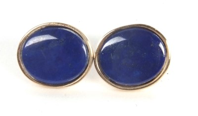 Lot 117 - A pair of lapis lazuli earrings, the oval...