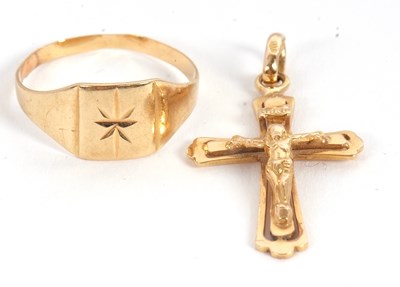 Lot 166 - A crucifix and a ring: the crucifix with bale...