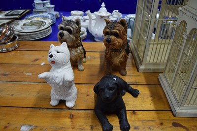 Lot 194 - Four resin models of dogs