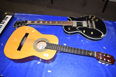 Lot 585 - Acoustic guitar together with an electric guitar