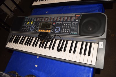 Lot 587 - A Casio CTK601 electronic keyboard
