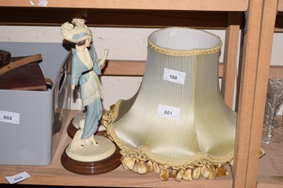 Lot 601 - Two small resin figures together with small...