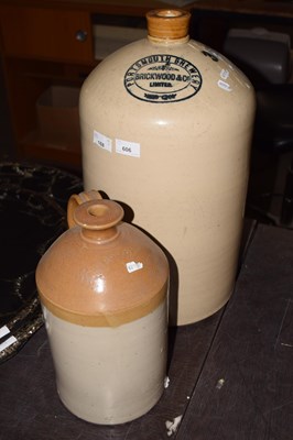 Lot 606 - Two large stone ware flagons
