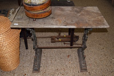 Lot 297 - Victorian cast iron base and wooden topped table