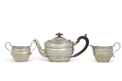 Lot 206 - A George V silver three piece tea service of...