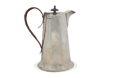 Lot 224 - A George V silver hot water jug of plain...
