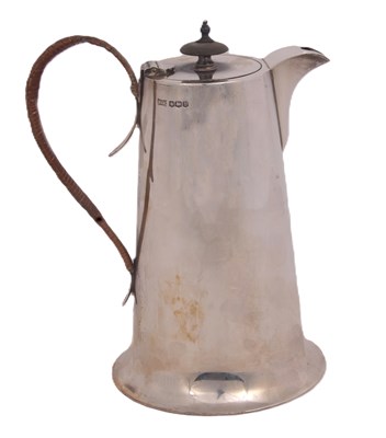 Lot 224 - A George V silver hot water jug of plain...