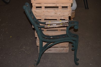 Lot 648 - A pair of cast iron bench ends