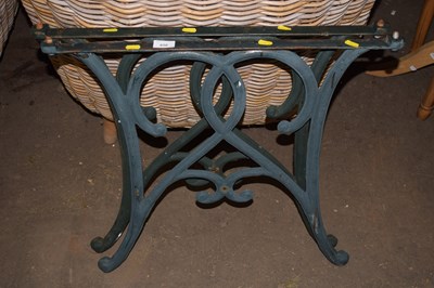 Lot 650 - A pair of cast iron garden table ends