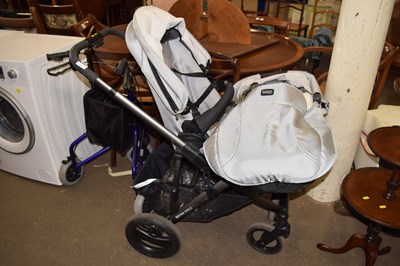 Lot 670 - A Britax pushchair and travel cot