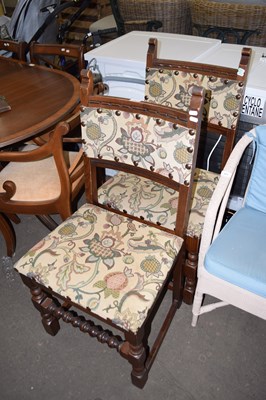 Lot 676 - A pair of floral upholstered dining chairs