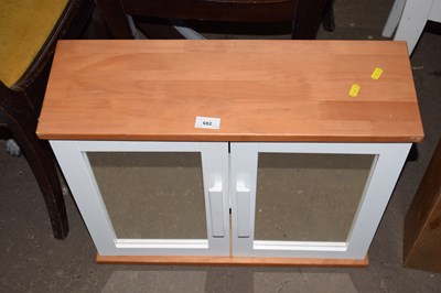 Lot 682 - A two door bathroom cabinet