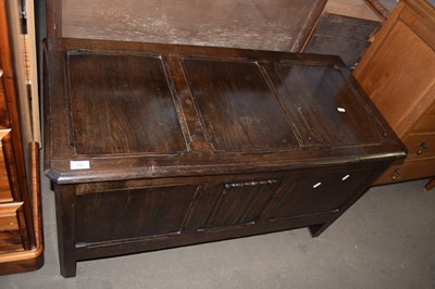 Lot 692 - A 20th Century oak coffer with linen fold detail