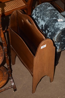 Lot 701 - A retro magazine rack