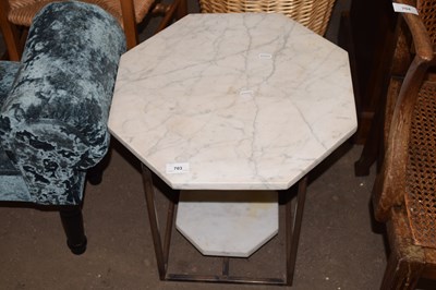 Lot 703 - A metal framed and marble octagonal topped...