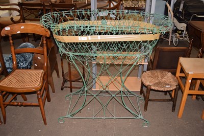 Lot 709 - A Victorian style green painted wire work...