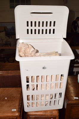 Lot 719 - A white plastic laundry basket