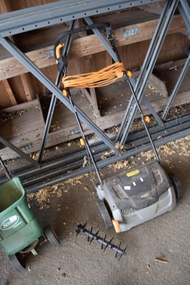 Lot 332 - A lawn scarifier
