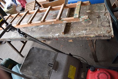 Lot 364 - A well used vintage tressel table and a...