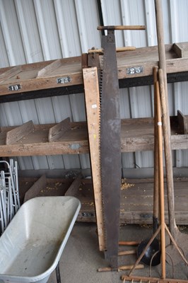 Lot 381 - Three large antique two man pit saws