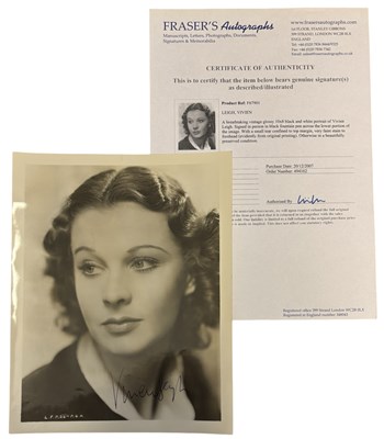 Lot 103 - A black and white 8x10'' headshot bearing the...