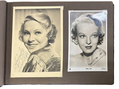 Lot 102 - An album containing a quantity of signed...