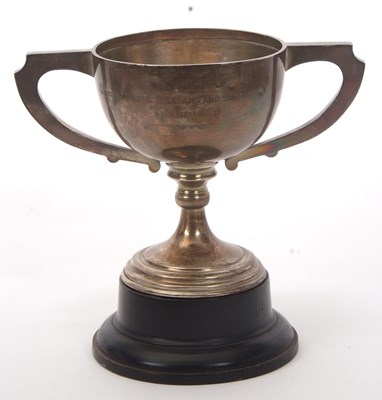 Lot 16 - A George V silver twin handled presentation...