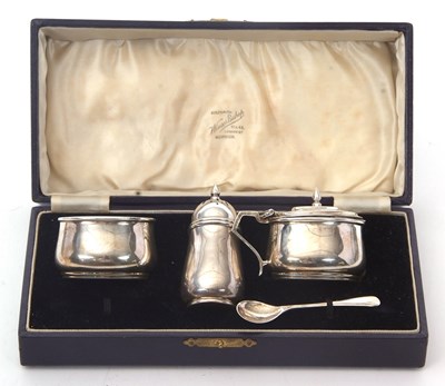 Lot 30 - A cased George VI silver condiment set to...