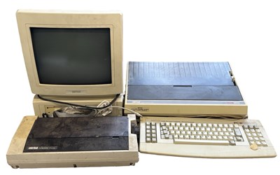 Lot 441 - An AMSTRAD PCW9512 computer, together with...