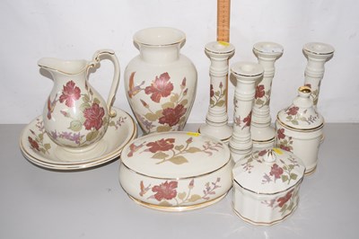 Lot 4 - A collection of floral decorated candlesticks,...