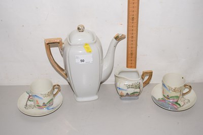 Lot 50 - A Japanese porcelain lustre ware part coffee set