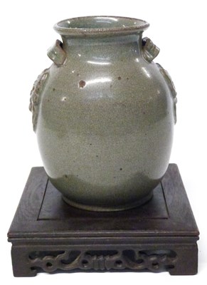 Lot 204 - A Chinese pottery vase with slate grey glaze...