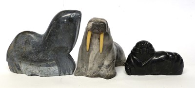 Lot 207 - A group of Inuit stone carved walrus's