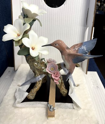 Lot 257 - A Lladro model of a hummingbird, limited...