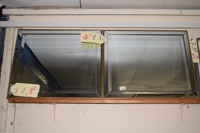 Lot 220 - A pair of rectangular bevelled wall mirrors