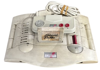 Lot 436 - A vintage AMSTRAD games console, controller...