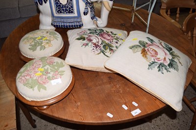 Lot 261 - A pair of small floral covered footstools and...