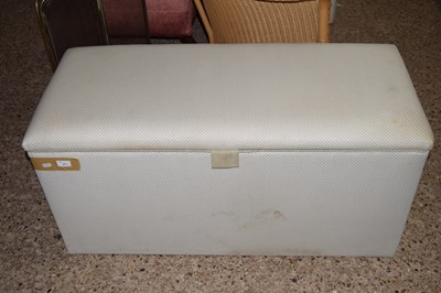 Lot 271 - A cream upholstered blanket box