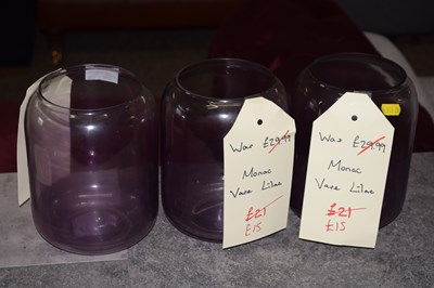 Lot 306 - A set of Monarc purple tinted glass vases