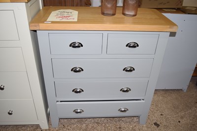 Lot 319 - A modern oak top two over three chest of drawers