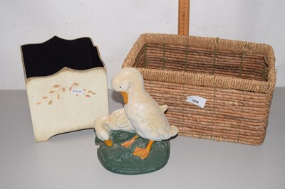 Lot 504 - An iron duck shaped door stop, a small wicker...