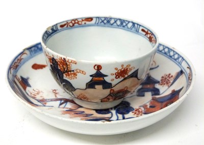 Lot 271 - A Lowestoft porcelain tea bowl and saucer in...