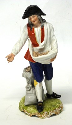 Lot 273 - A 19th Century porcelain figure of a seed...