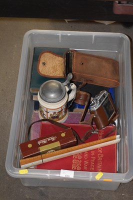 Lot 666 - Box of various assorted books, beer stein,...
