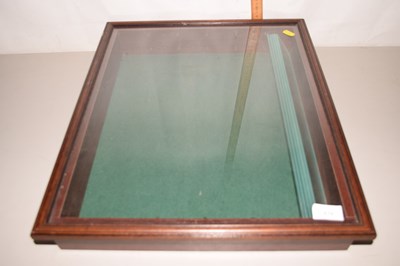 Lot 676 - A glazed display cabinet