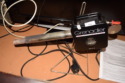 Lot 753 - A Grenadier electric fire lighter