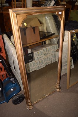 Lot 777 - A narrow rectangular gilt wood framed...