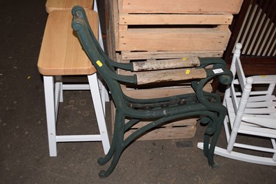 Lot 787 - A pair of green painted cast iron bench ends