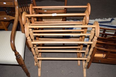 Lot 846 - Three wooden towel horses