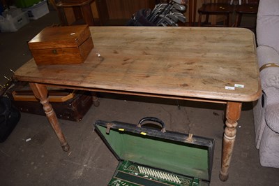 Lot 817 - A pine kitchen table on turned legs